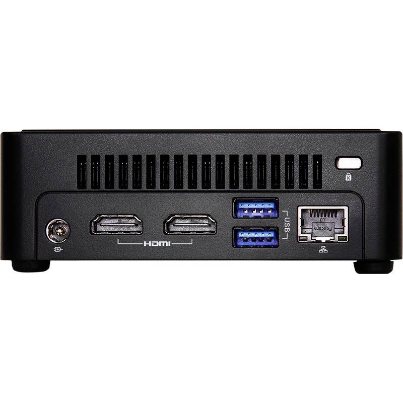 Un mini PC nero con due porte HDMI, due porte USB blu e una porta Ethernet sul retro.