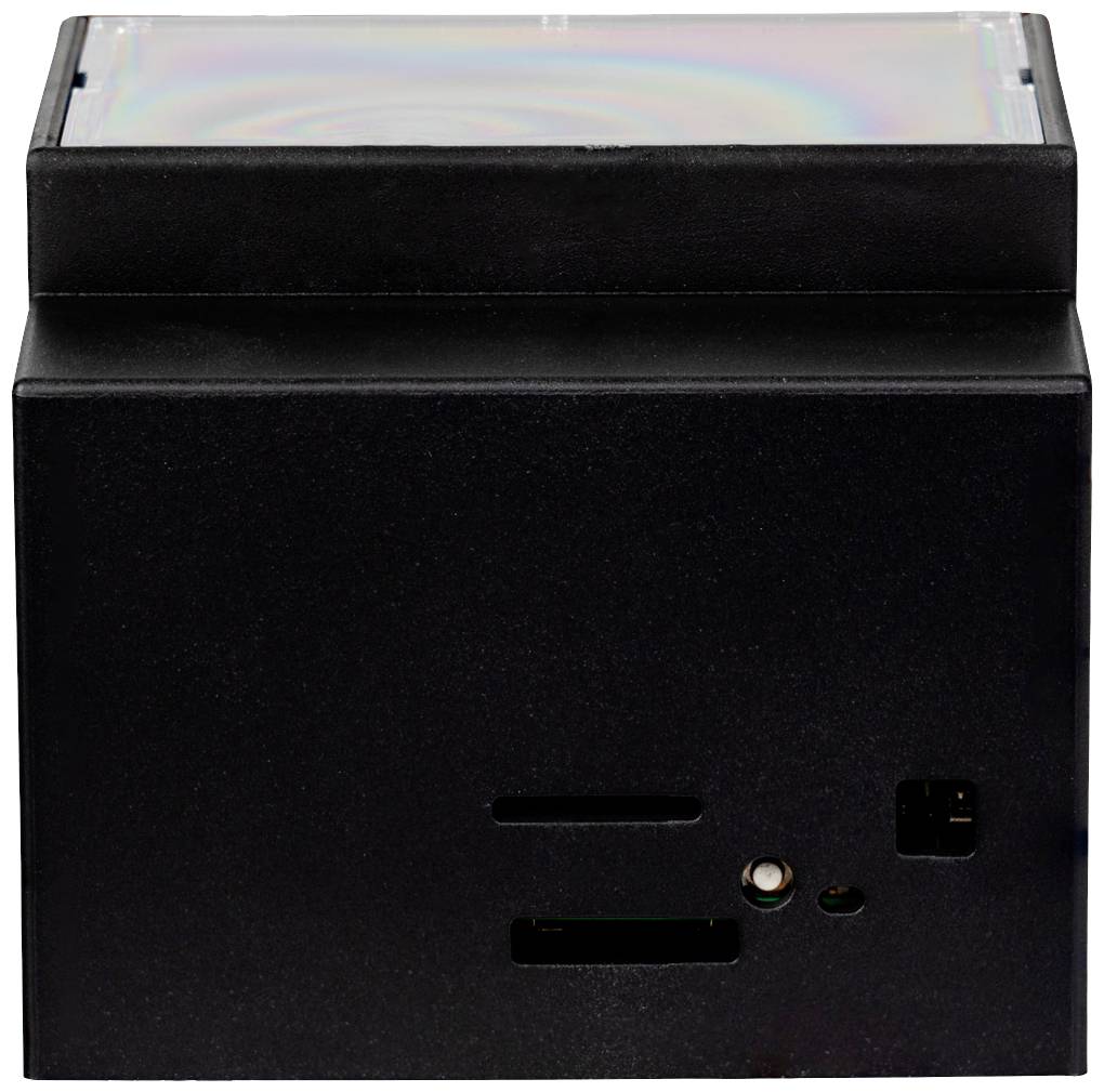 Un dispositivo elettronico nero con fessure e porte sul lato anteriore. In alto è presente una lastra trasparente e riflettente.