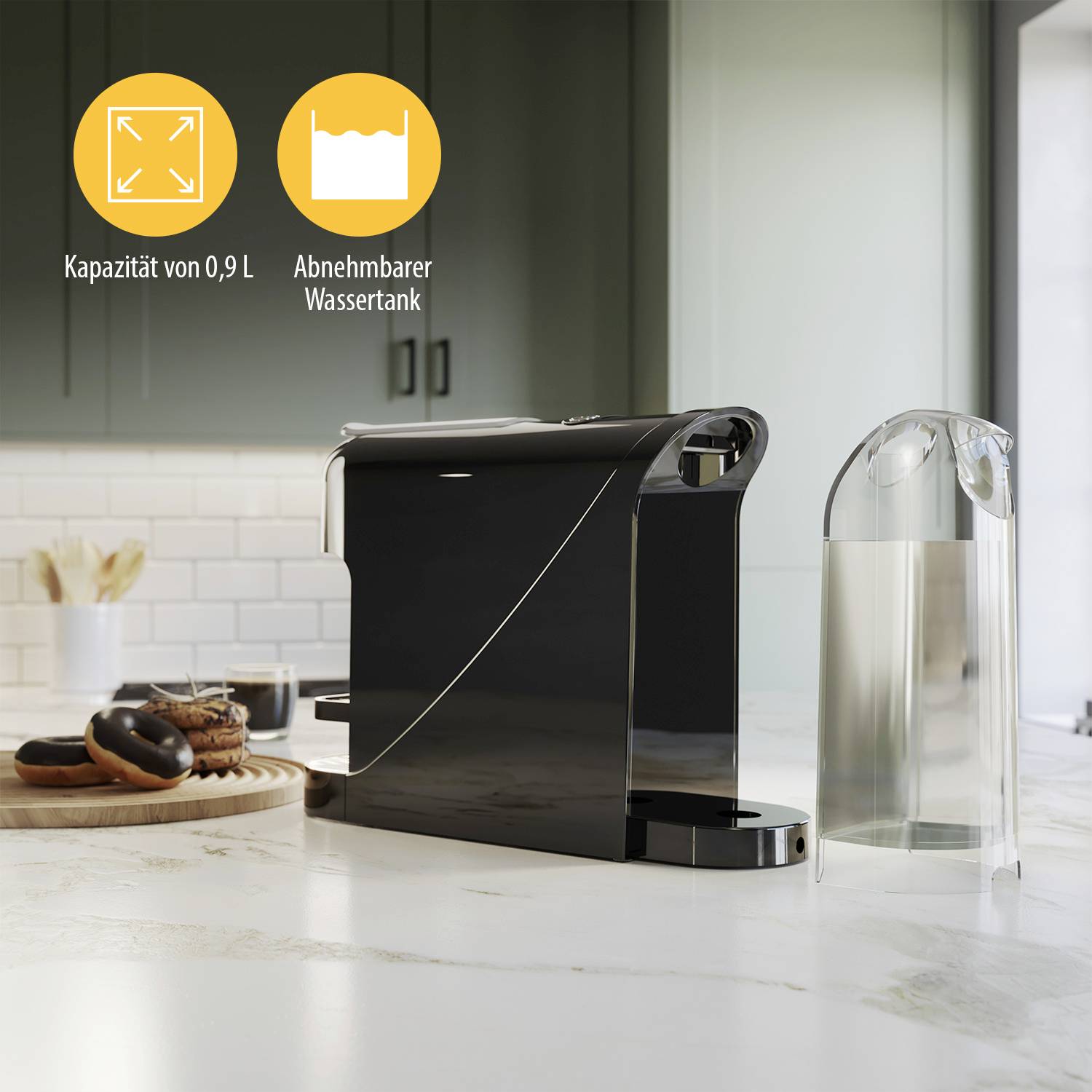 Una macchina da caffè nera con serbatoio dell'acqua removibile è posizionata in una cucina moderna. Accanto, dei dolci sono disposti su un tagliere di legno.