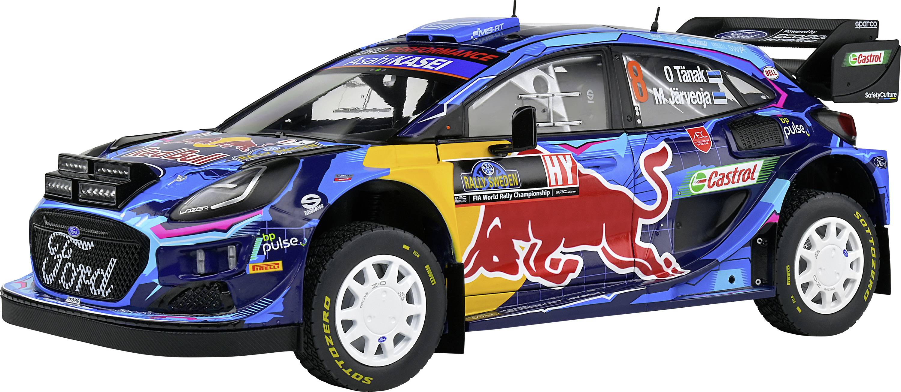 Un'auto da rally blu con un vistoso design a forma di toro rosso sul lato, sponsorizzata da 'Castrol' e 'Ford', su sfondo bianco.