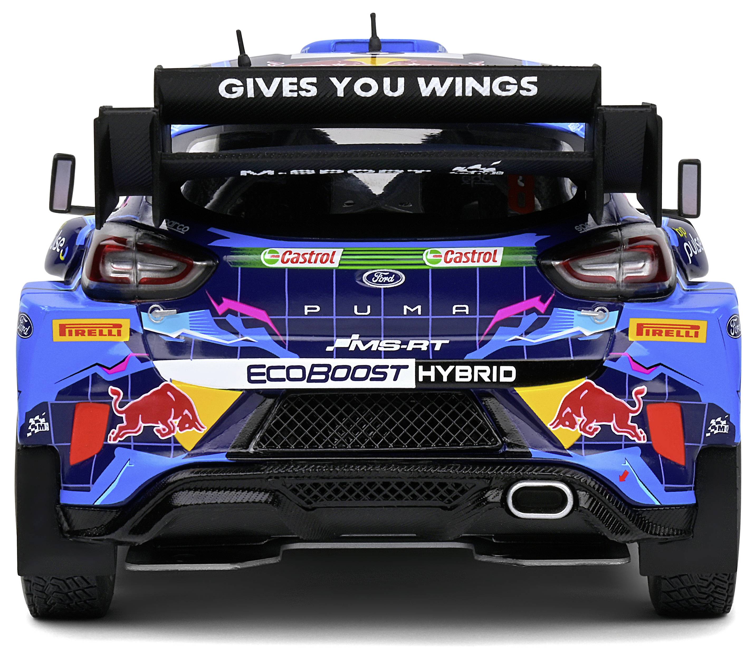 Auto da rally con verniciatura blu e diversi loghi sponsor, tra cui Castrol, Pirelli e Red Bull. Testo sull'alettone posteriore: 'Ti dà le ali'.