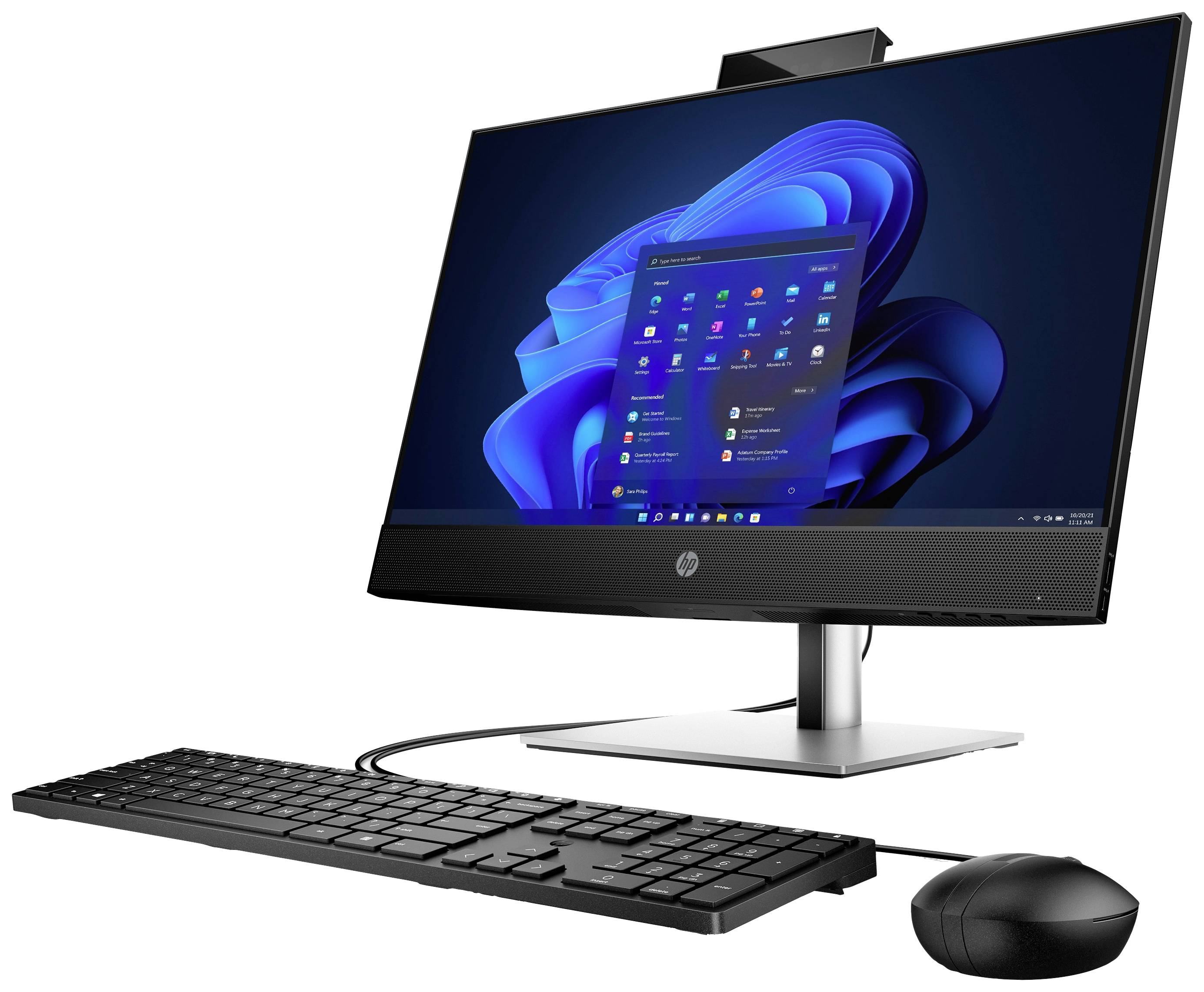 Un computer desktop all-in-one moderno con tastiera e mouse, su cui è in esecuzione Windows 11, è in uso.