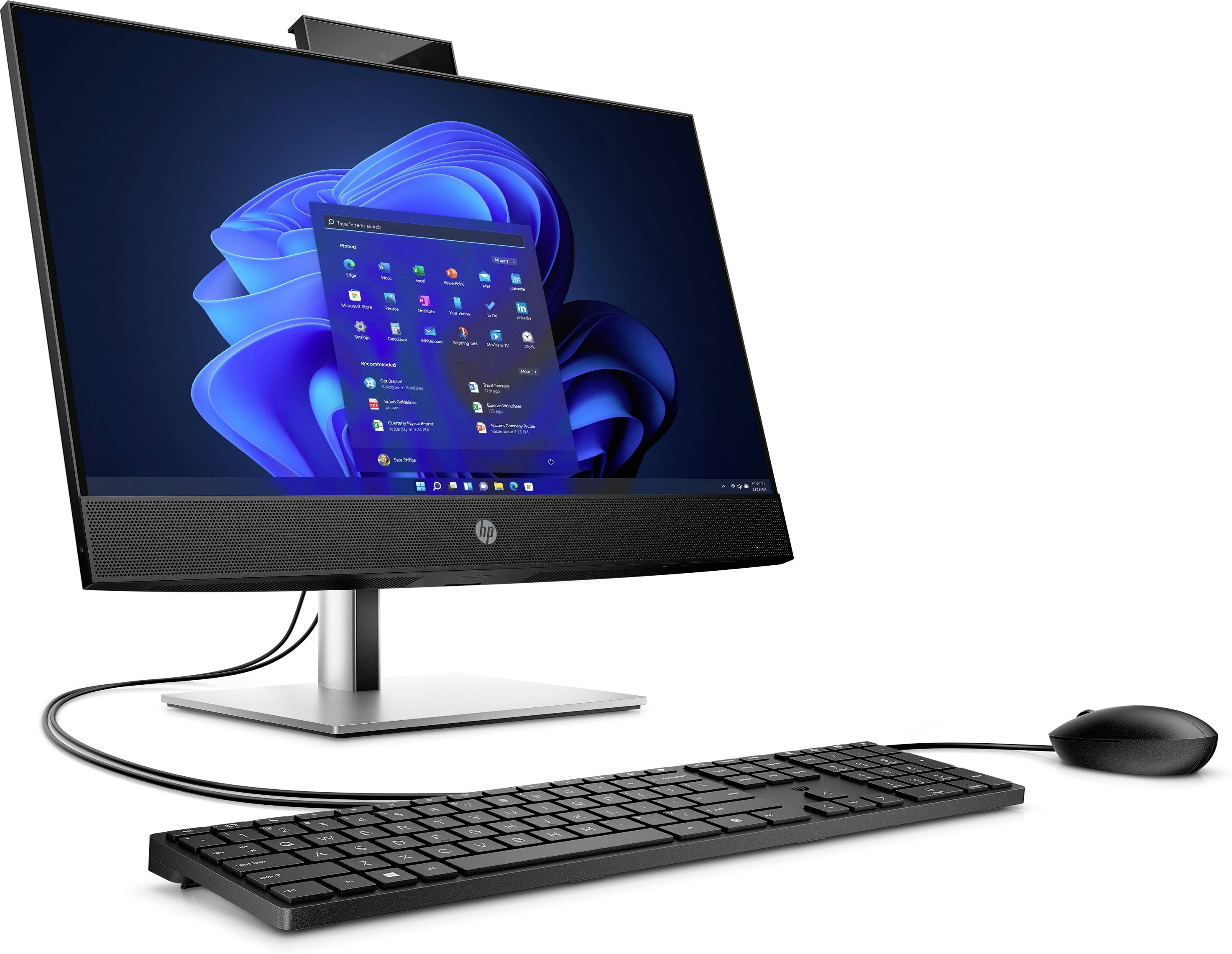 Un computer desktop con monitor mostra una schermata di avvio di Windows. Tastiera e mouse sono collegati.