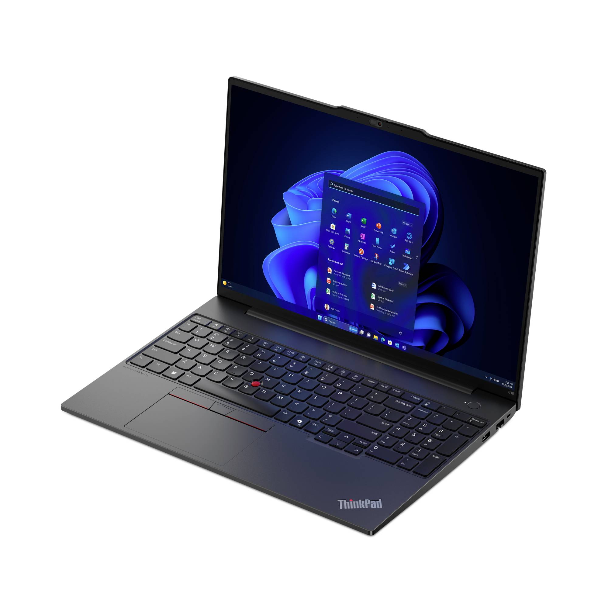Un laptop aperto con tastiera grigio scuro mostra la schermata iniziale di Windows 11 con varie icone di app sul display.