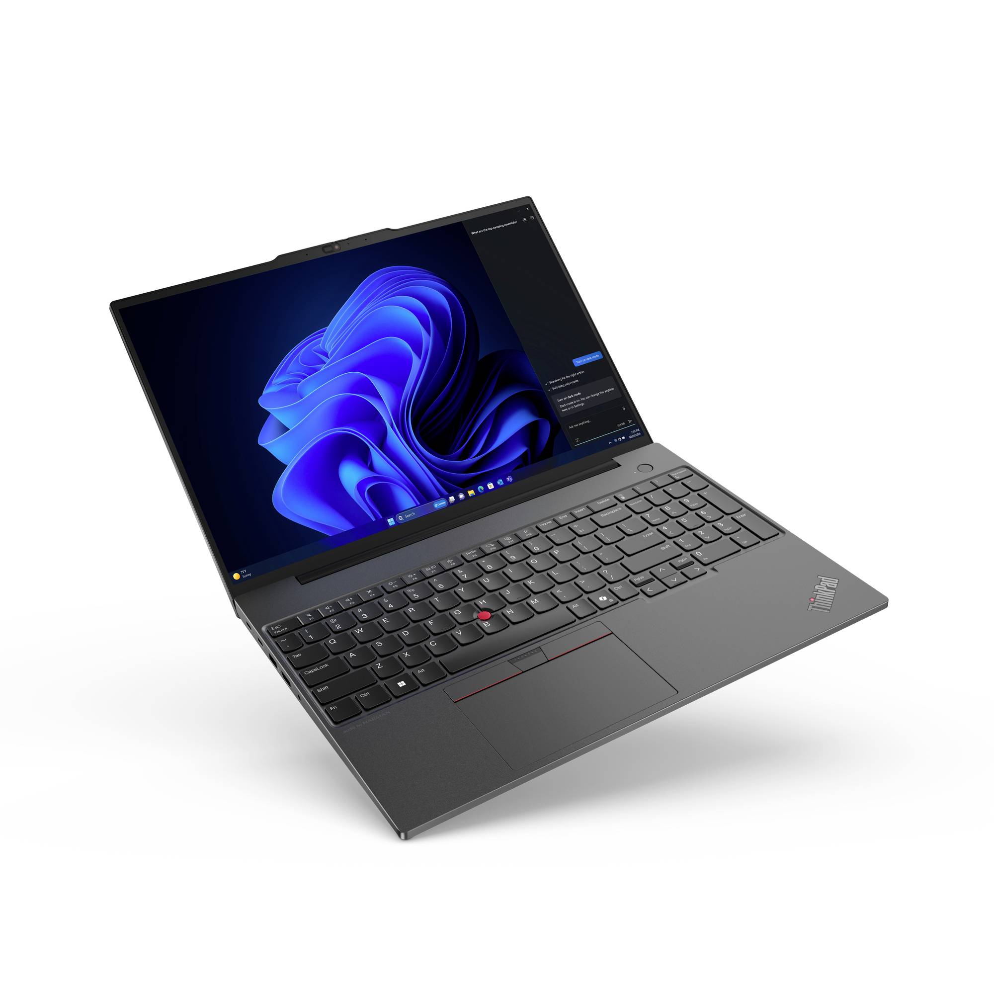 Un laptop aperto con tastiera nera e schermo che mostra uno sfondo blu.