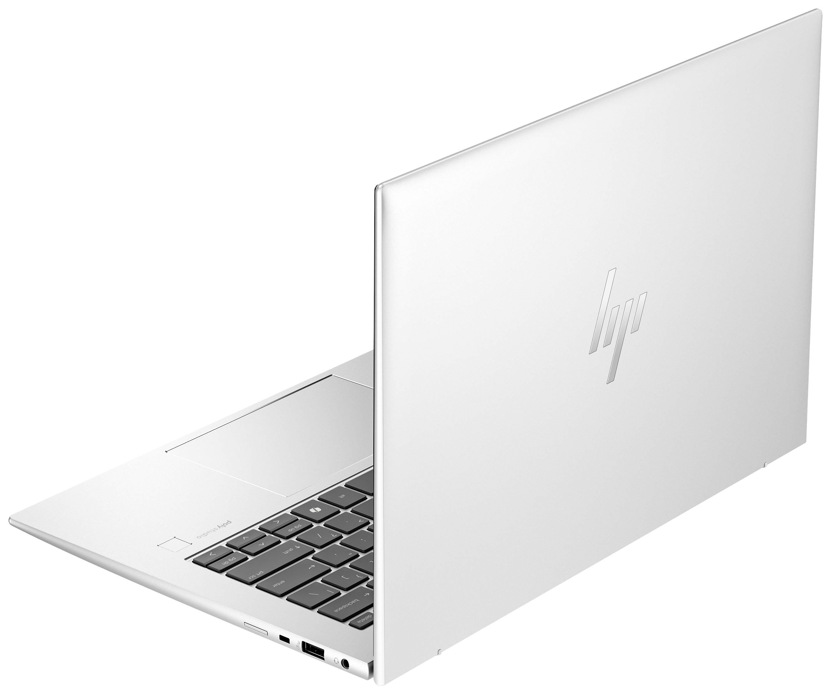 Laptop HP color argento con schermo aperto, visto di lato e leggermente da dietro. Il logo HP è visibile sul coperchio.