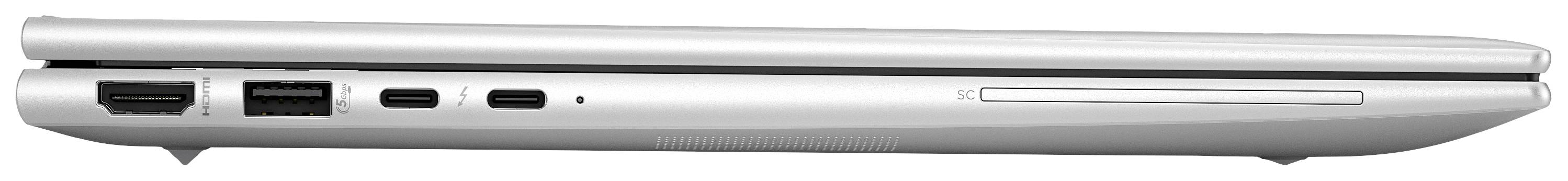Un laptop argentato, chiuso di lato, mostra diversi porte e un lettore ottico sul lato sinistro.