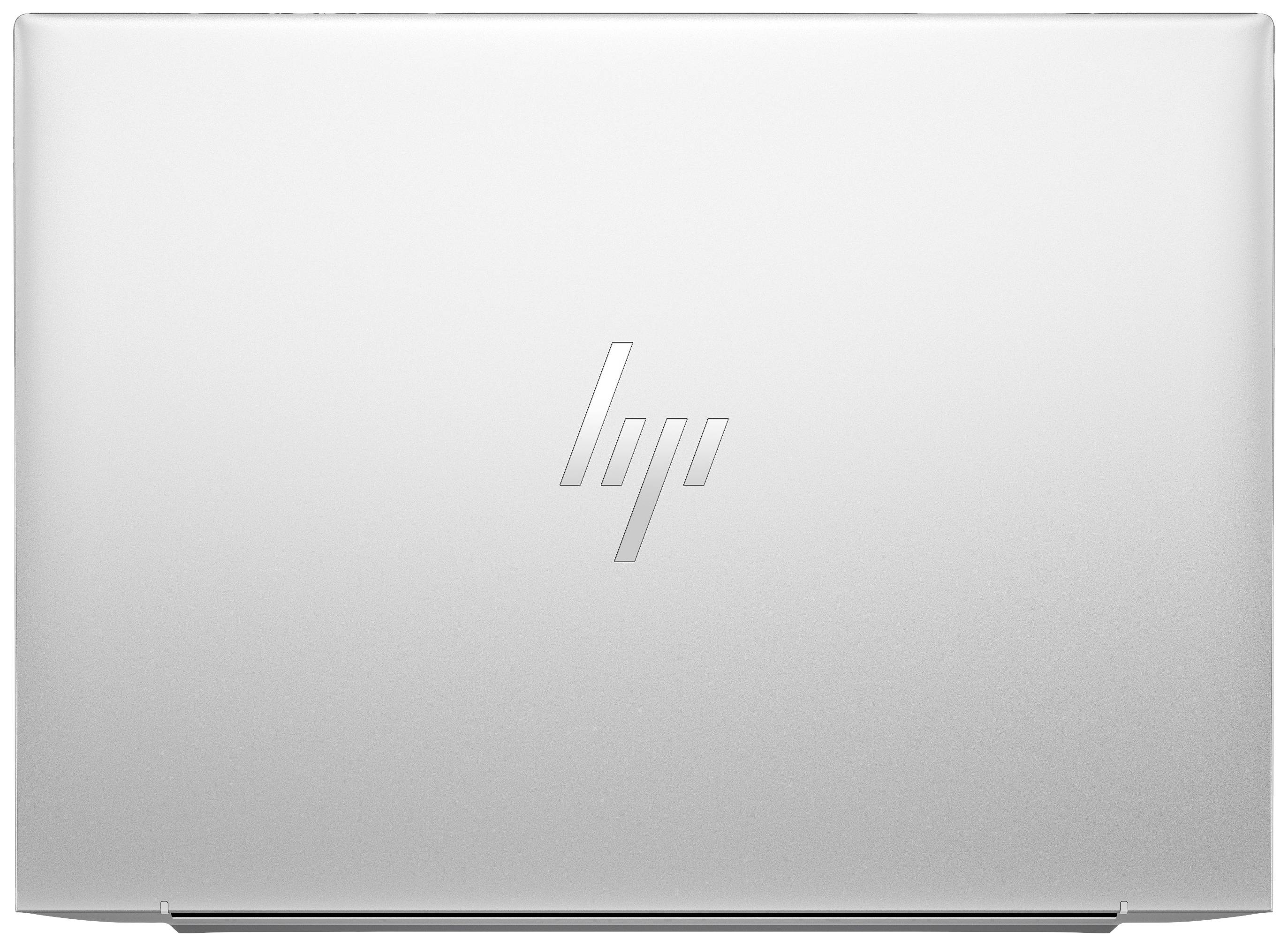 Coperchio argentato di un laptop con il logo di un produttore di computer al centro.