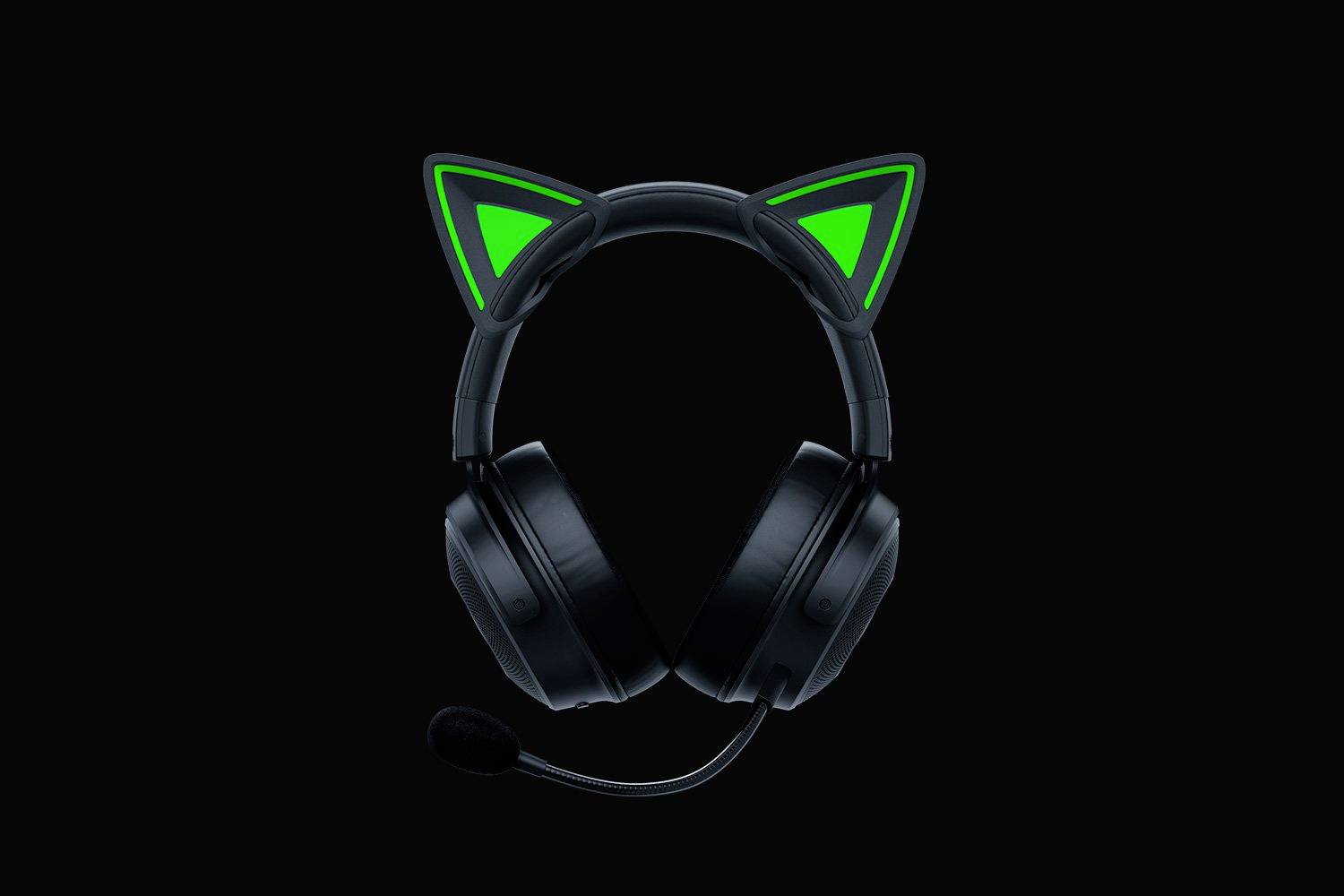 Cuffie nere con orecchie da gatto luminose su sfondo scuro; microfono fissato sul lato sinistro.