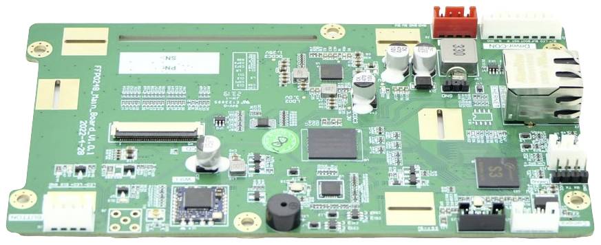Una scheda elettronica verde con diversi chip, connettori e componenti elettronici per funzioni di controllo.