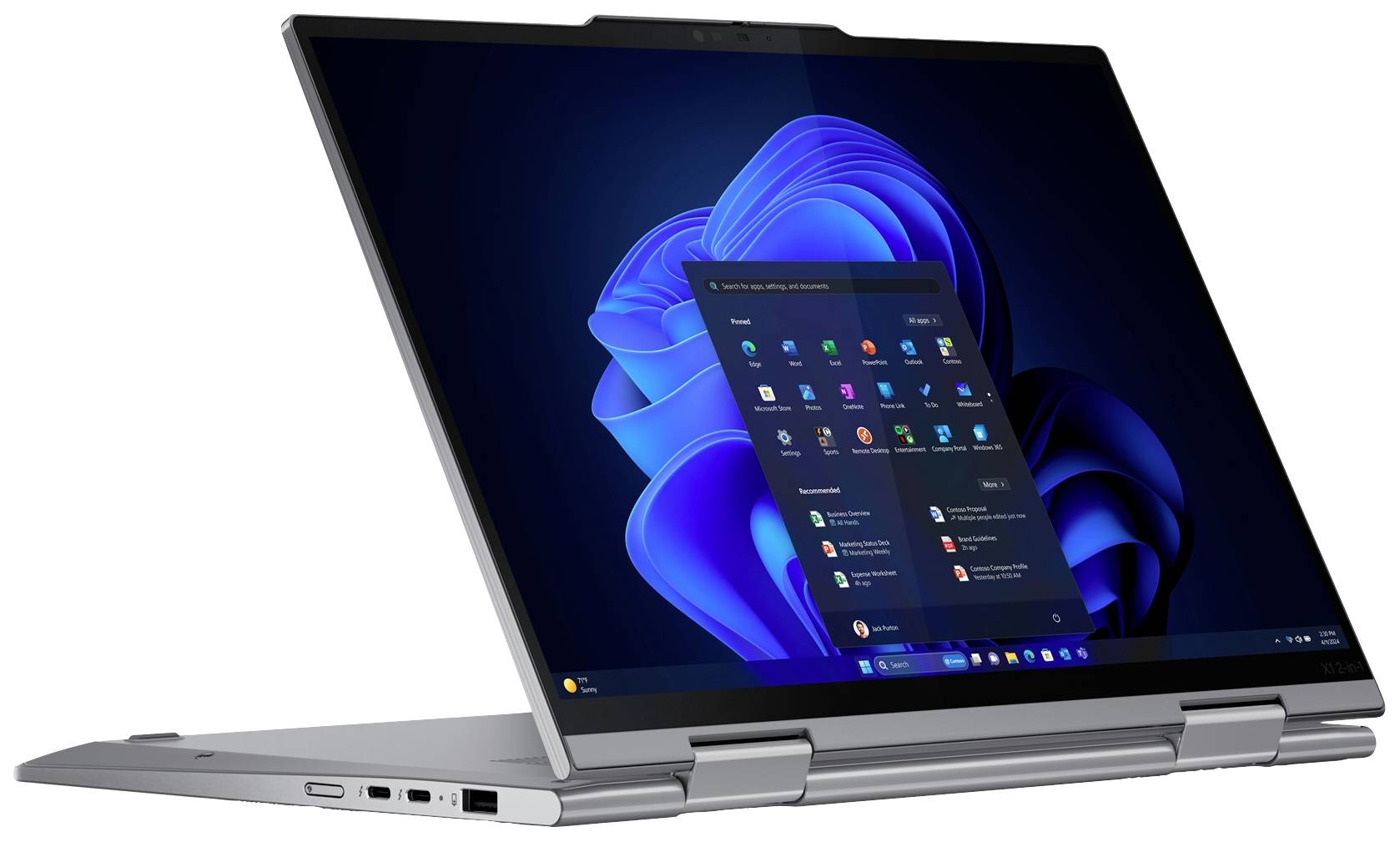 Un laptop apribile in modalità tenda mostra la schermata di avvio di Windows 11 con varie icone di app su sfondo blu.