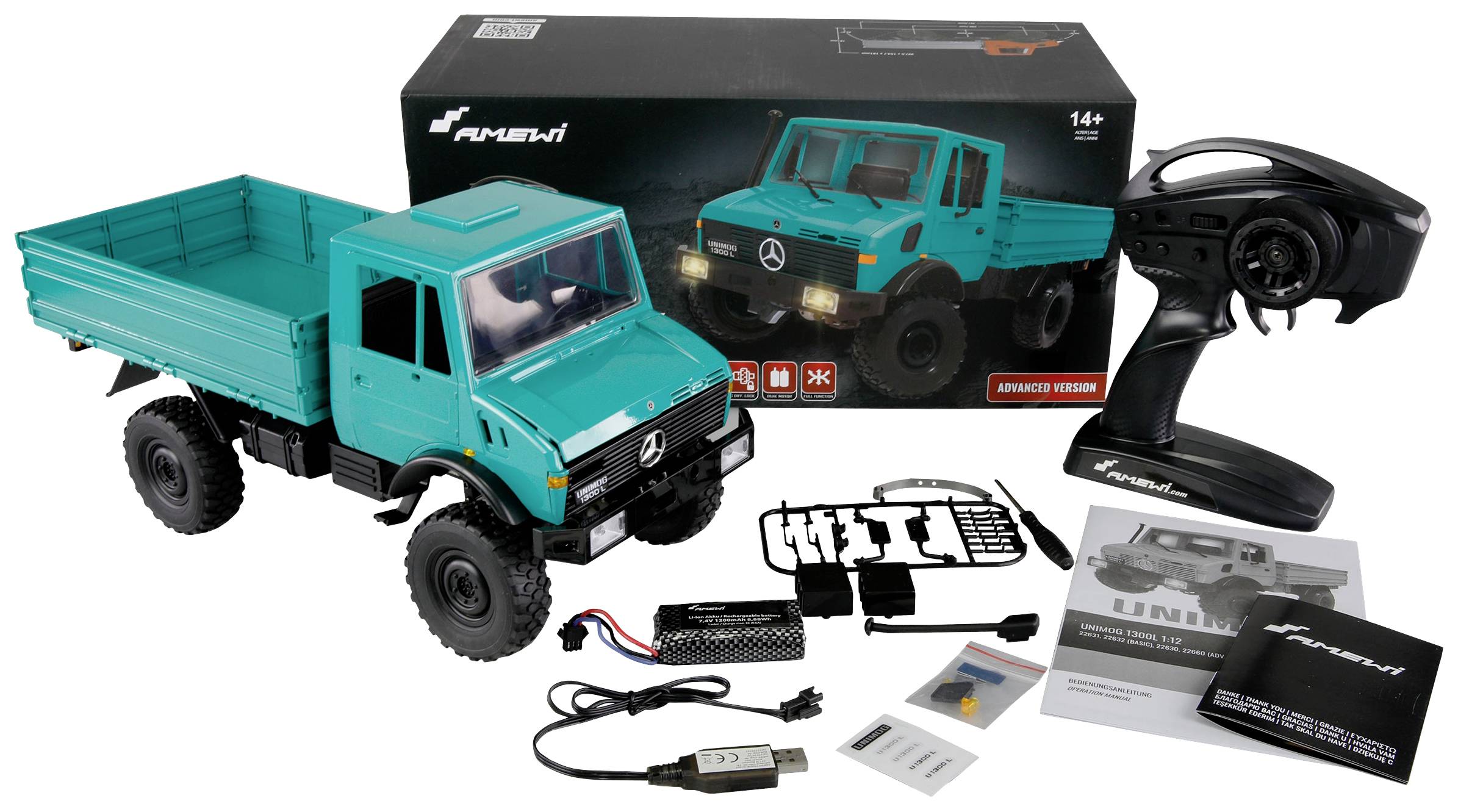 Modello di camion giocattolo radiocomandato, con batterie e accessori, accanto alla confezione originale. Adatto a persone di età superiore ai 14 anni.