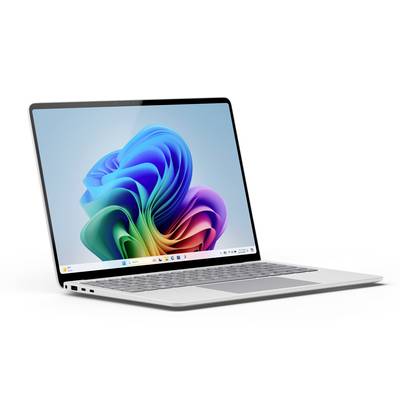Un laptop moderno con uno sfondo astratto e colorato sullo schermo, rappresentato in prospettiva obliqua dal lato sinistro.
