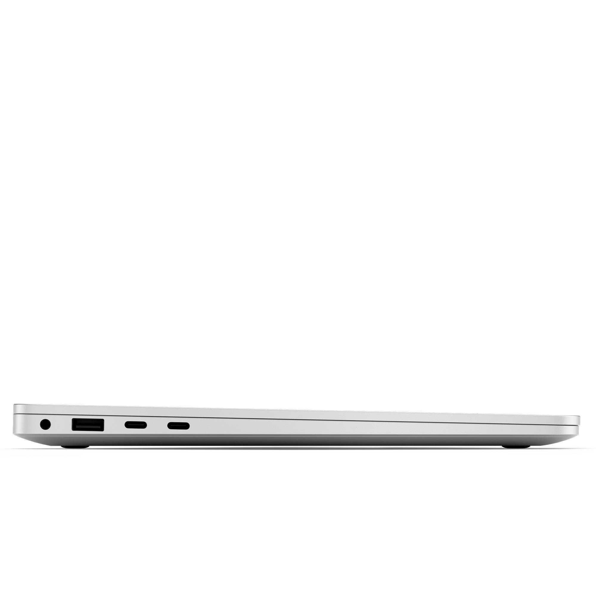 Laptop sottile a chiuso, visto di lato, mostra le porte e un design moderno e snello.