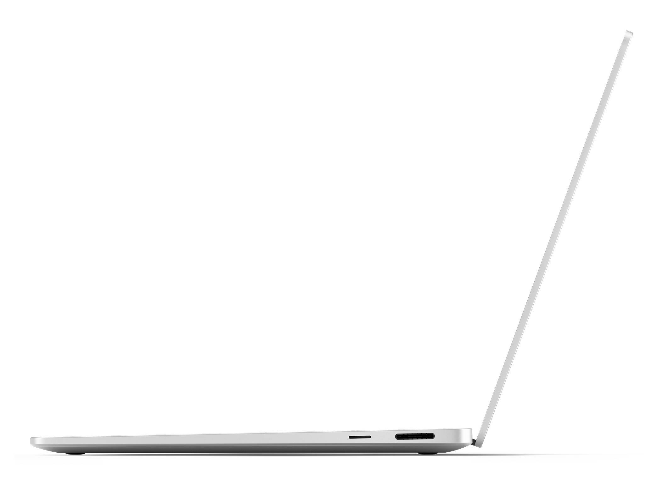 Un sottile laptop argentato fotografato di lato, aperto di profilo.