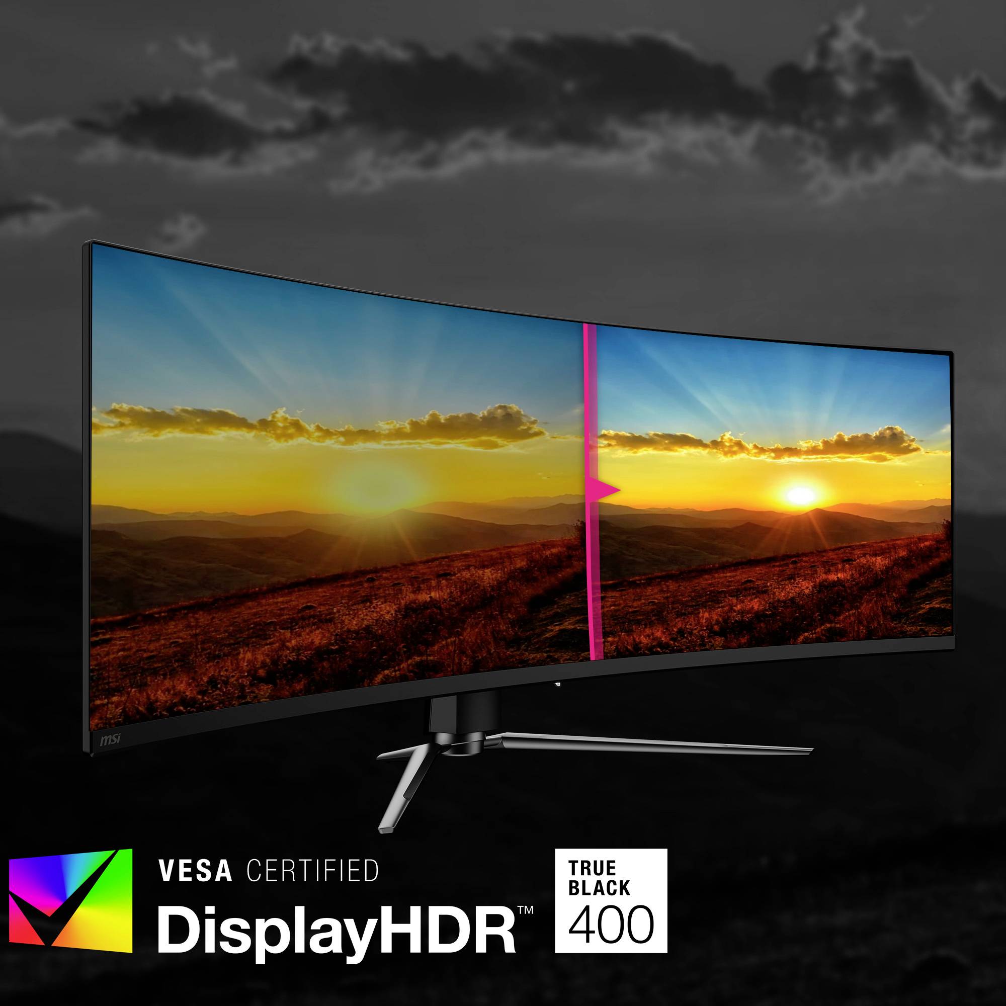 Un monitor ultra-wide mostra un paesaggio al tramonto con colori vivaci. Certificazioni: VESA DisplayHDR e True Black.