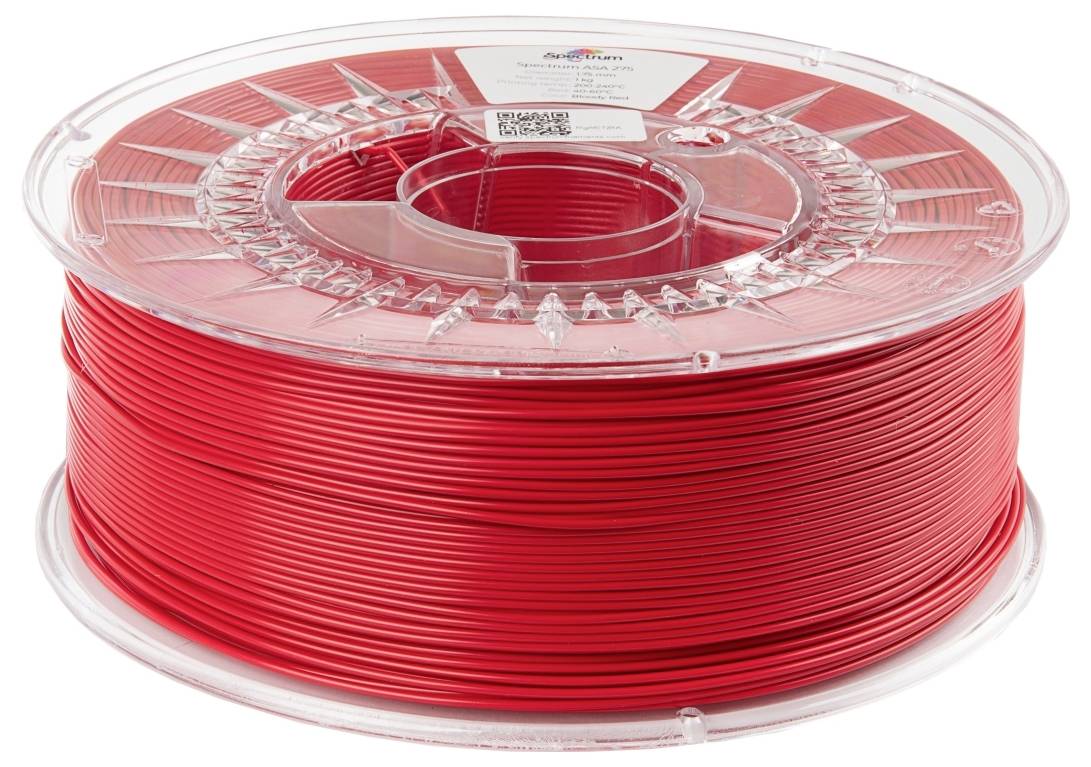 Una bobina trasparente con filamento rosso per stampante 3D. La bobina è completamente piena e ha un'etichetta in alto.