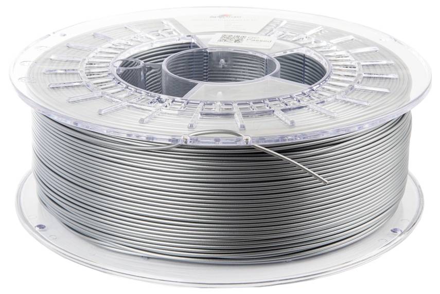 Un rullo di filamento grigio per stampanti 3D, su una bobina trasparente, ben visibile e pronto all'uso.