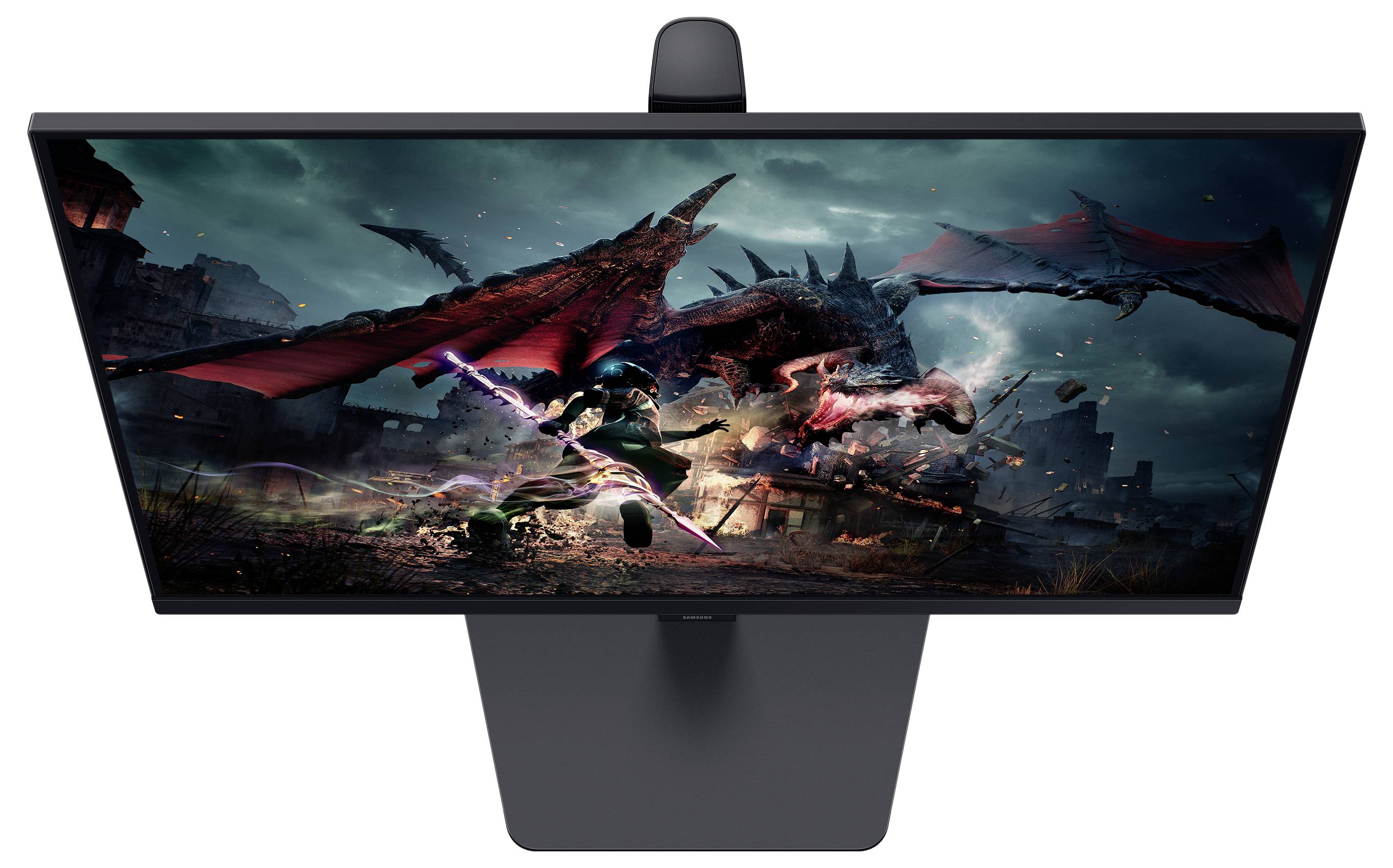 Uno schermo mostra una scena di un videogioco fantasy con un drago che combatte contro un guerriero armato di spada e magia.