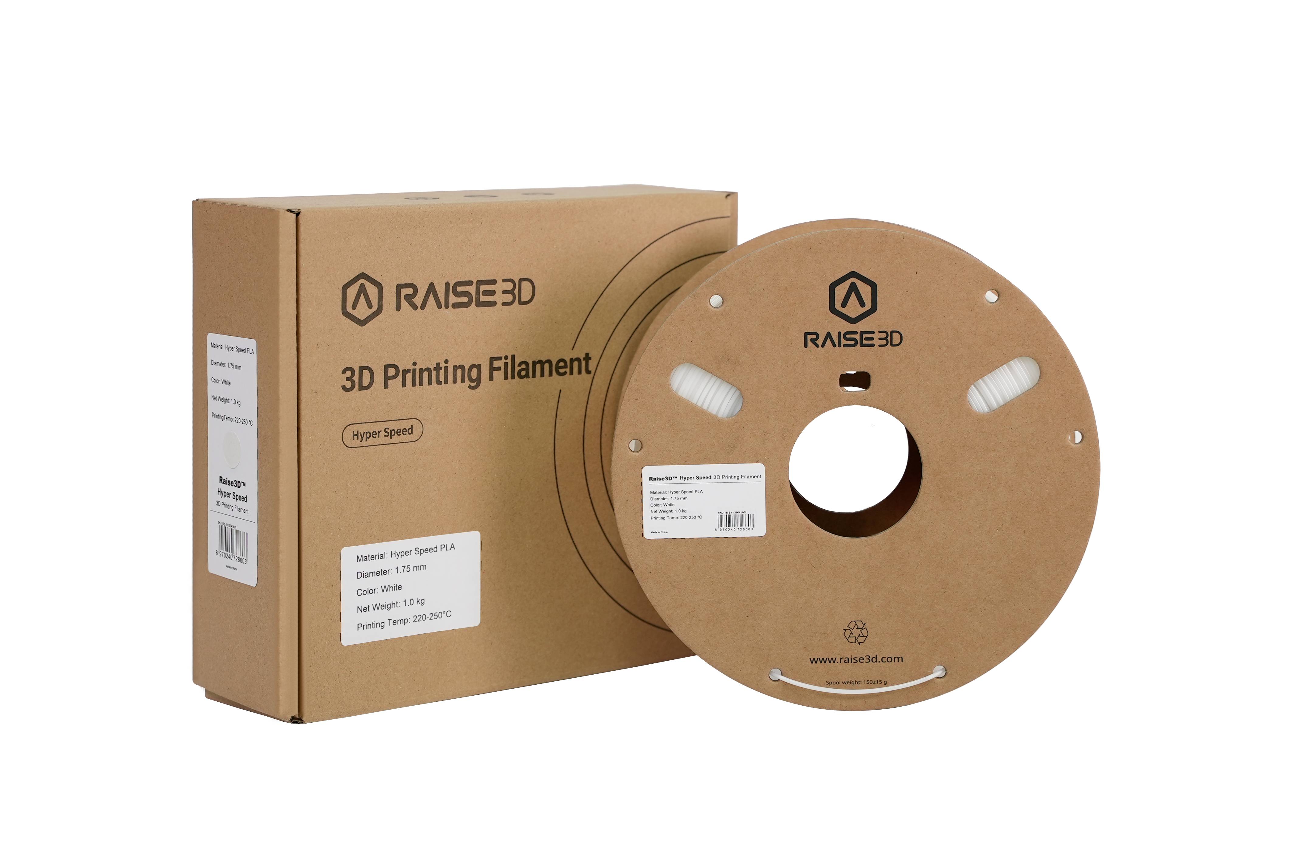 Una confezione di cartone e un rocchetto di filamento per stampa 3D del marchio Raise3D, etichettato con specifiche e logo.