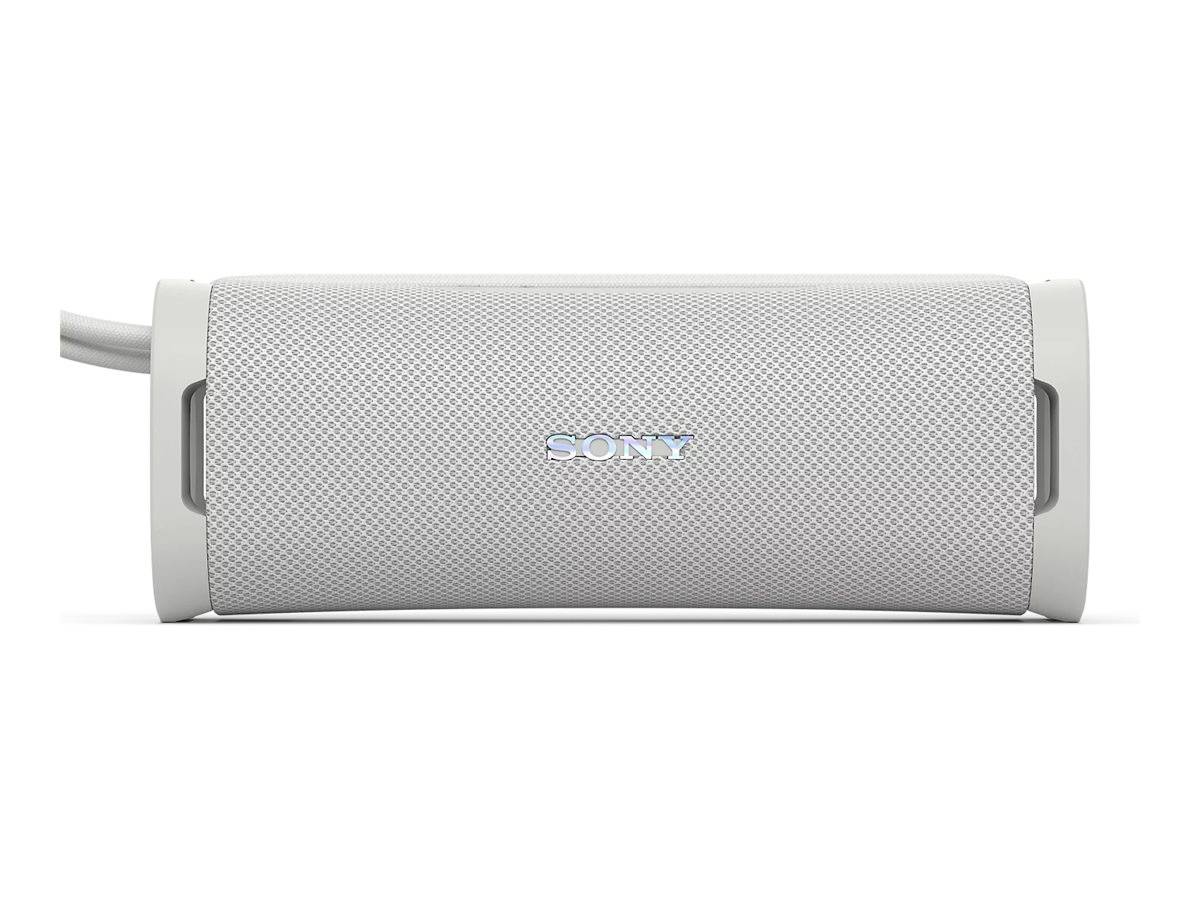Un altoparlante portatile bianco con il logo 'Sony' al centro. Forma rettangolare con angoli arrotondati.