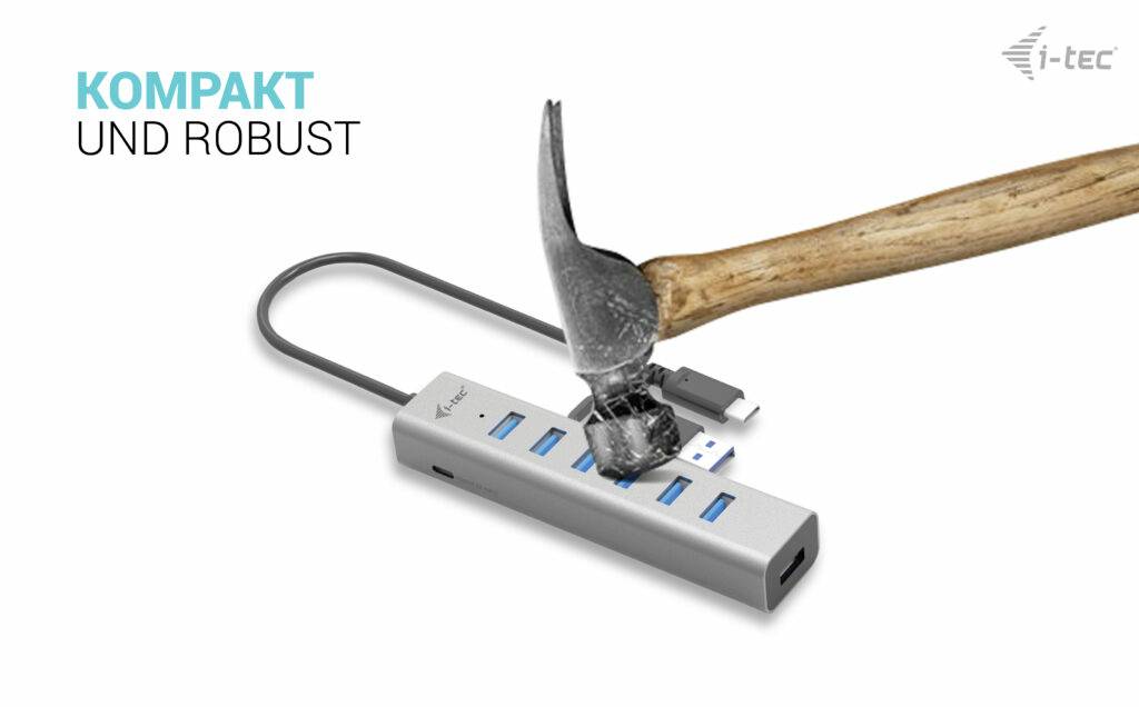 Un martello colpisce un hub USB robusto con più porte. Testo: 'Compatto e robusto', logo i-tec.