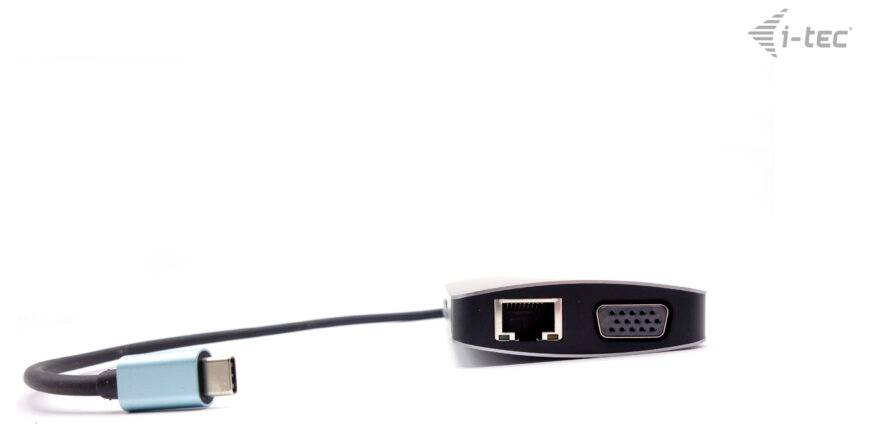 Un adattatore con porta USB-C, porte RJ-45/Ethernet e VGA. Marchio 'i-tec' in alto a destra nell'immagine.