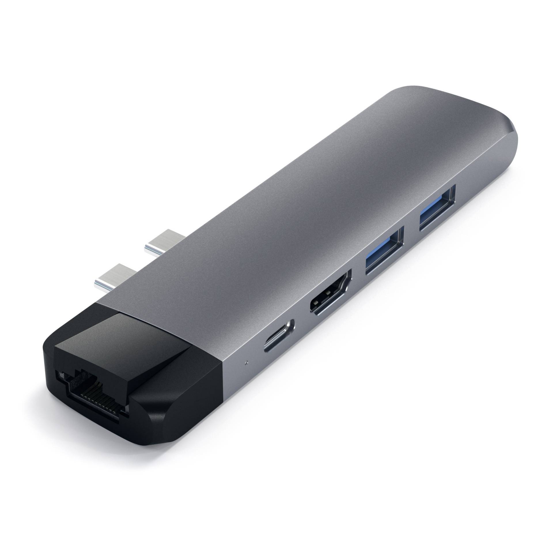 Un hub USB-C argentato con porta Ethernet, porta HDMI, porte USB e una porta USB-C, adatto per laptop.