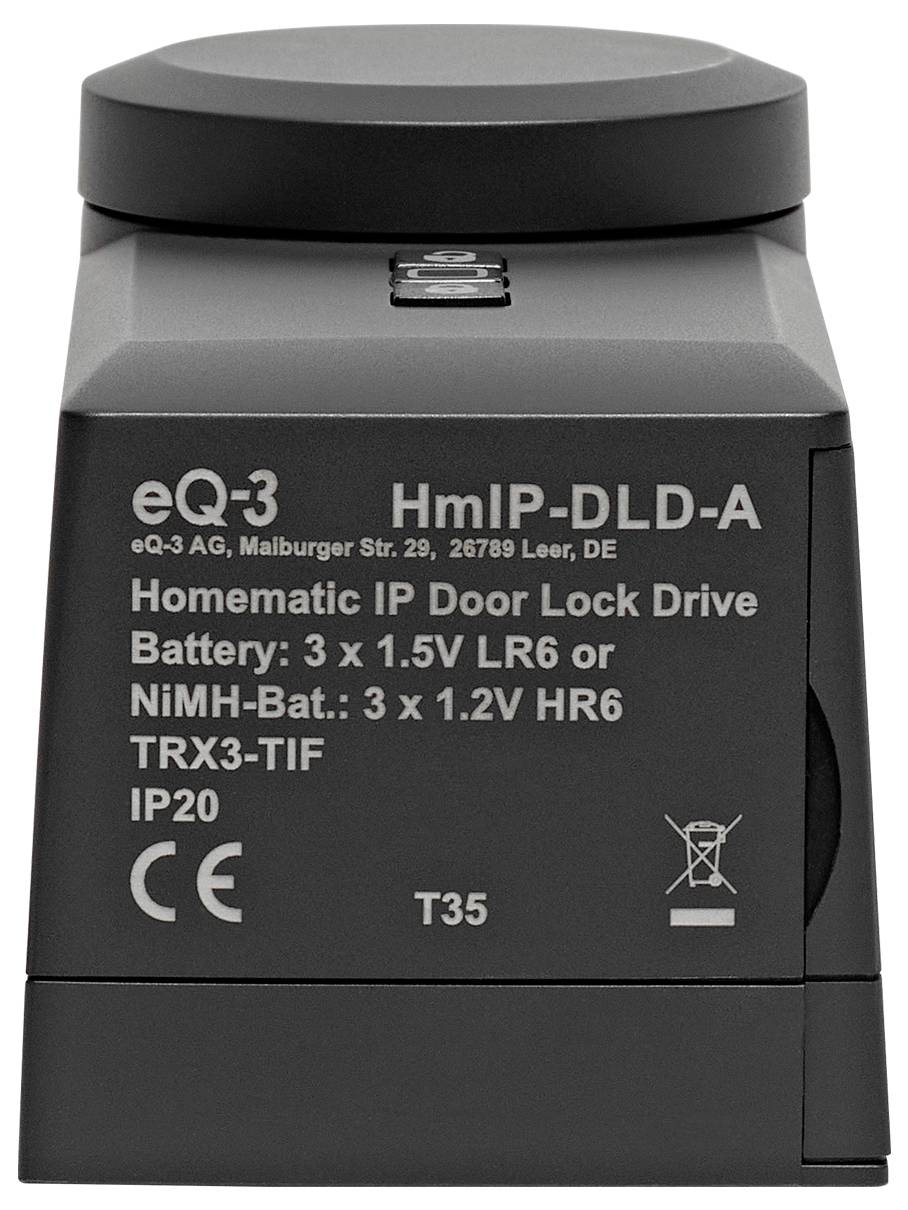 Un azionamento elettronico nero per serratura della porta 'HmIP-DLD-A' di eQ-3 con vano batteria e etichettatura in tedesco sul lato anteriore.