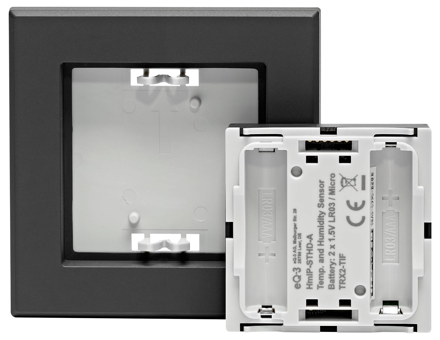 Lato anteriore e posteriore di un sensore di umidità da parete, con vano batteria e punti di connessione visibili.