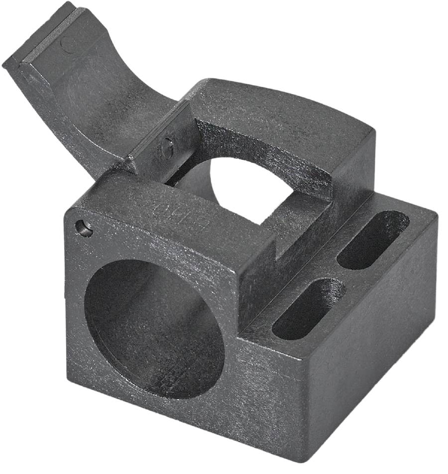 Blocco metallico con apertura circolare e rettangolare; apparentemente un componente tecnico, probabilmente per un'applicazione meccanica.