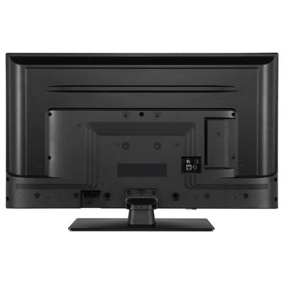 Vista posteriore di un televisore nero a schermo piatto su un piedistallo, con varie porte di connessione visibili sul retro.