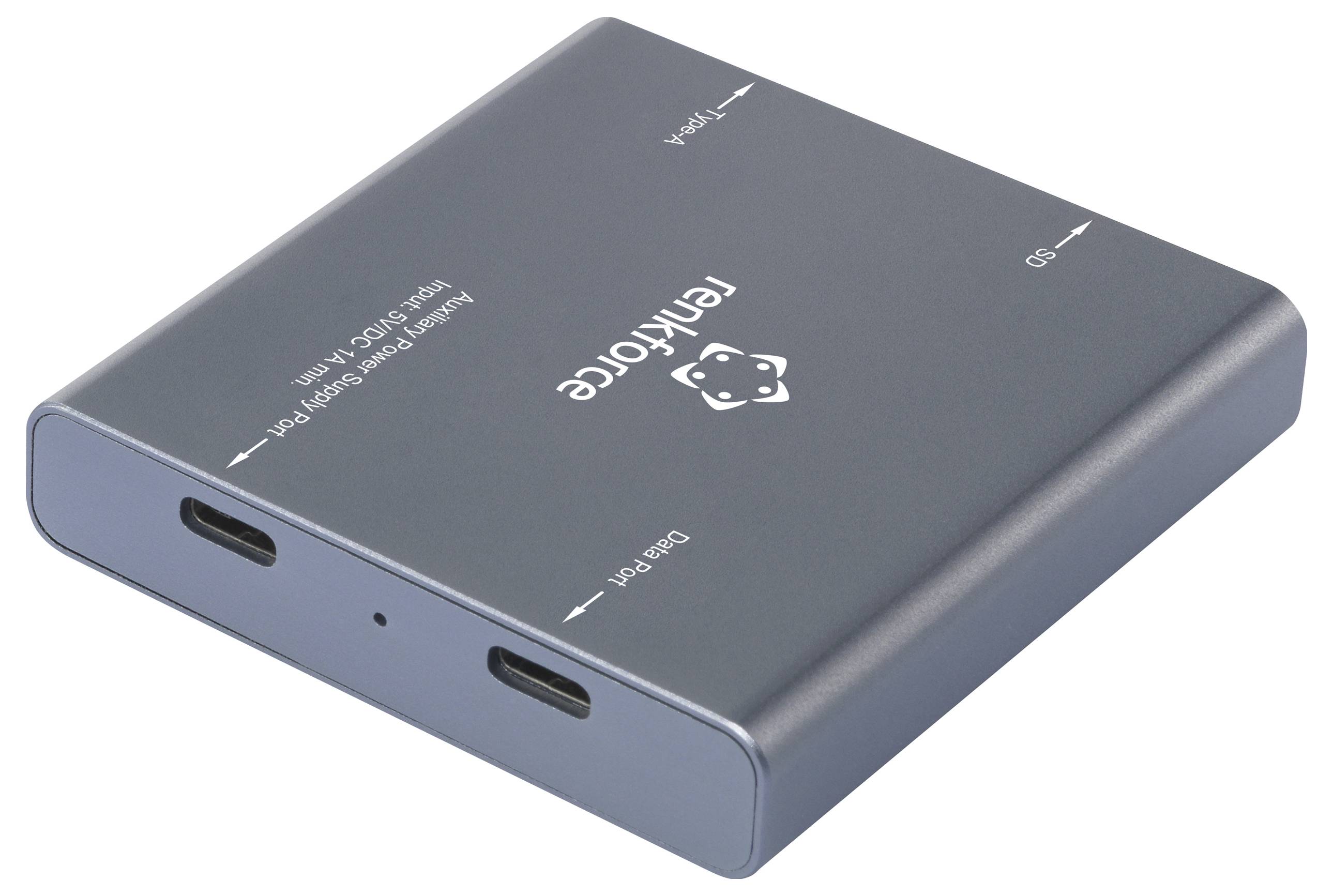 Un adattatore grigio con più porte, inclusi Disk Port e SD. Sul lato superiore il logo e il nome 'Fenekcore'.