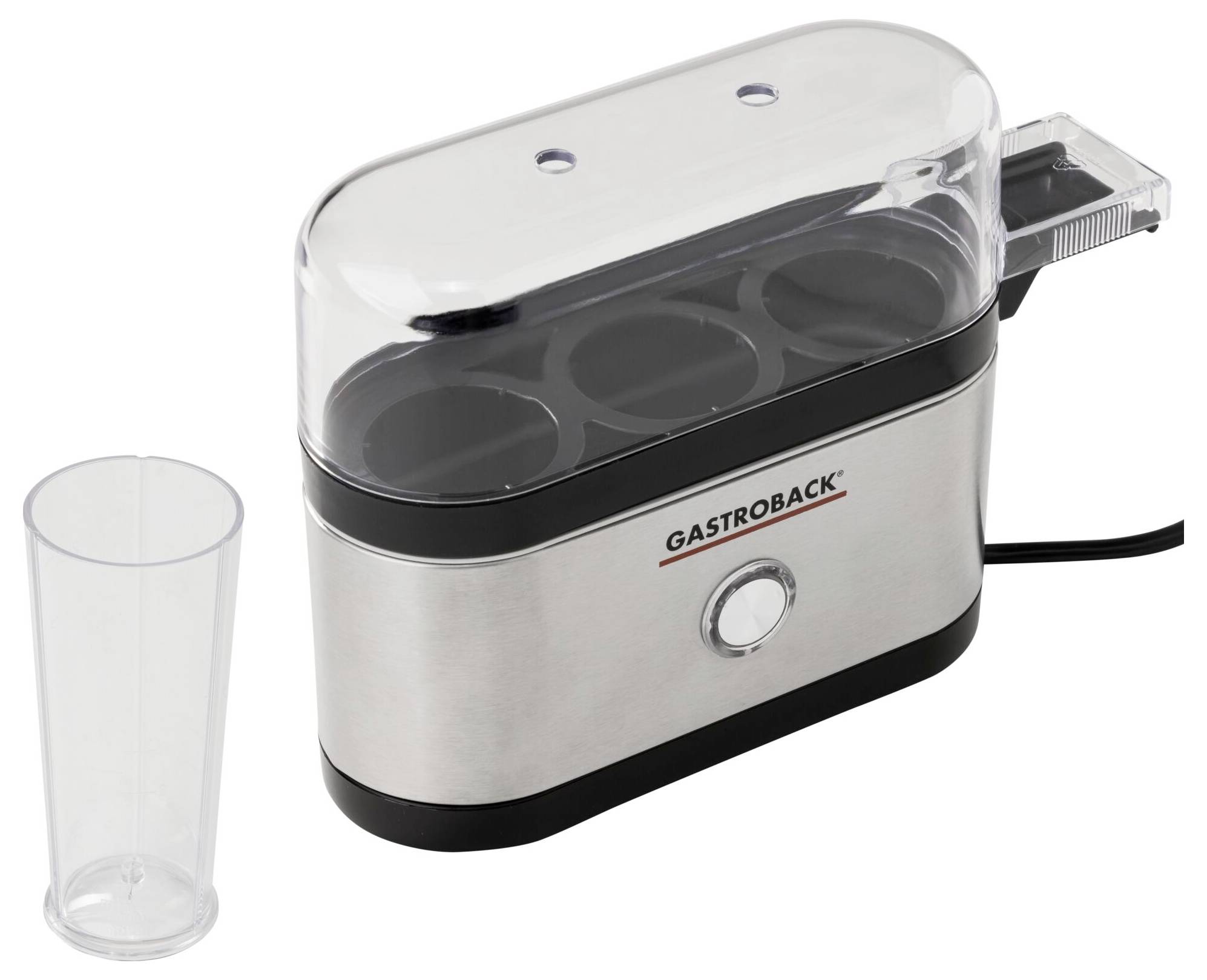 Cuocitore elettrico per uova in acciaio inox con coperchio trasparente, accanto a sinistra un bicchiere di plastica. Adatto per sei uova.