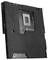 Retro di una scheda madre con involucro protettivo nero, socket della CPU esposto e numerose porte e circuiti.