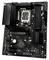 Scheda madre nera con molteplici slot e connettori per componenti del computer. Socket centrale della CPU visibile.