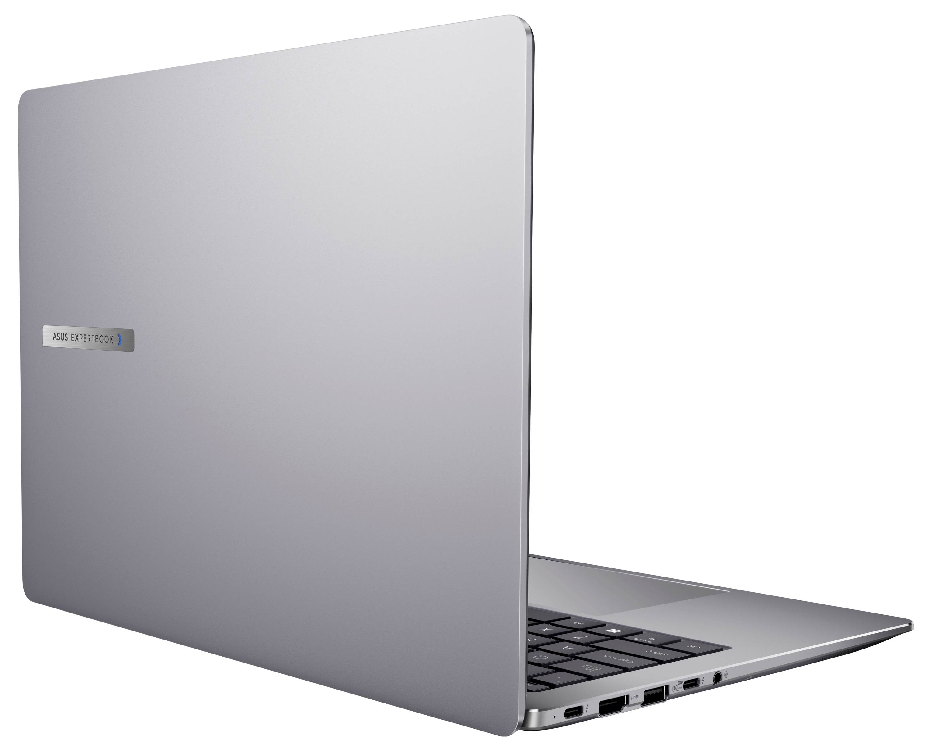 Un laptop argentato è parzialmente aperto, mostrando il suo retro e alcuni porte sul lato.