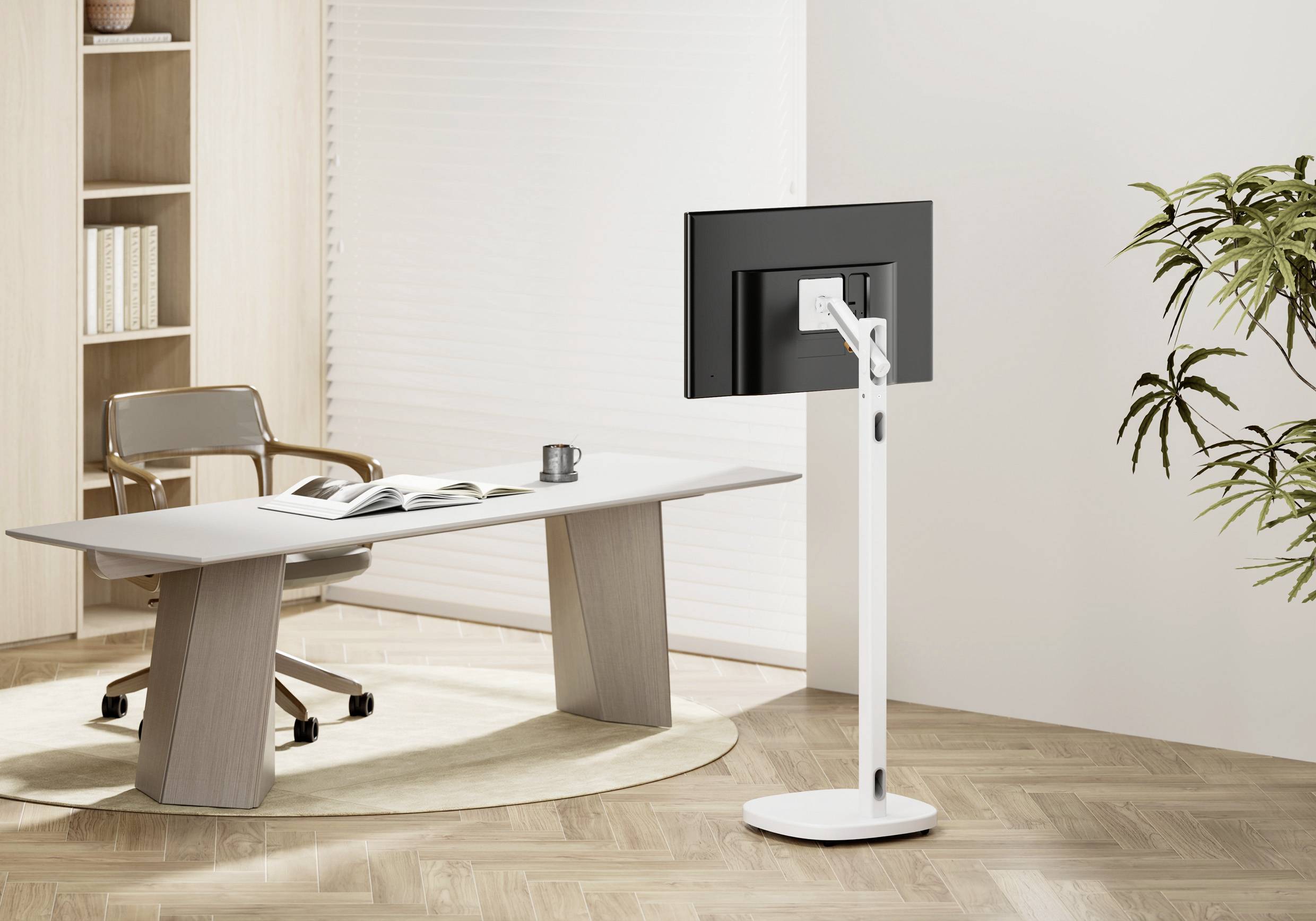 Spazio ufficio moderno con scrivania, sedia e un monitor indipendente su un supporto. Arredamento luminoso e minimalista con piante.