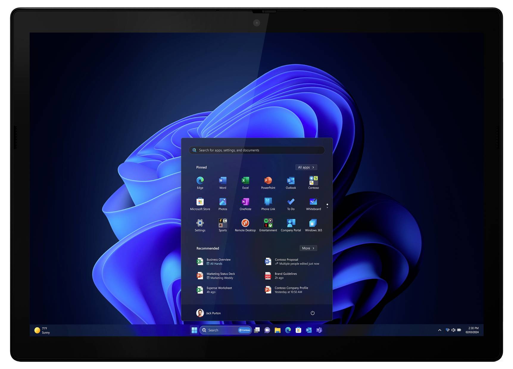Un tablet mostra la schermata iniziale di Windows 11. Al centro, il menu Start con diverse icone di app, su uno sfondo blu.