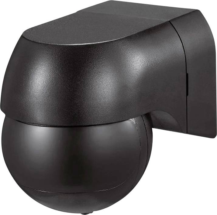 Un sensore di movimento nero montato su una parete, con design arrotondato, serve a rilevare movimenti per il controllo automatico dell'illuminazione.