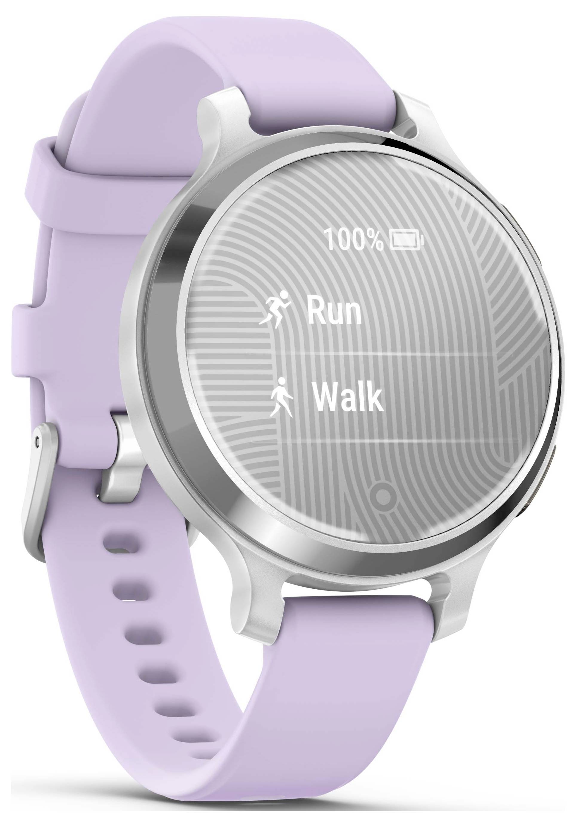 Un smartwatch con un cinturino viola mostra le modalità 'Corsa' e 'Camminata' sul display rotondo.