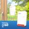 Router FRITZ!Box 5G-WLAN davanti a una finestra, con vista su un giardino verde. Testo 'FRITZ!Box 6860 5G'.