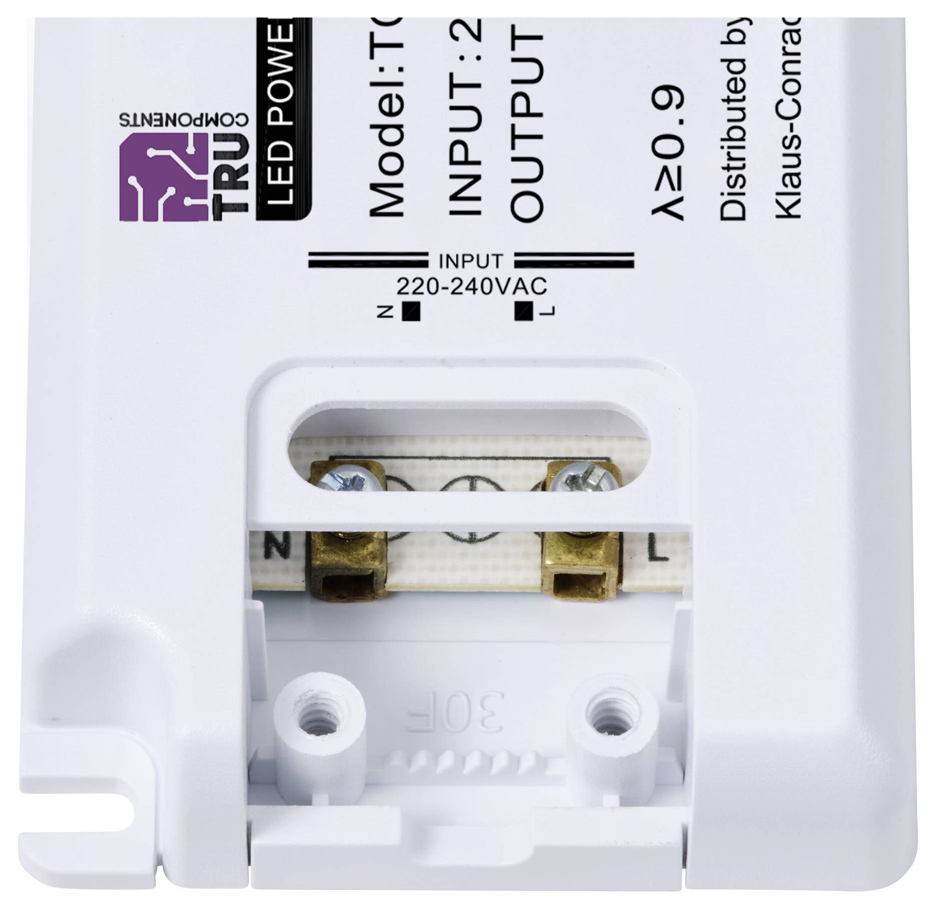 Un dispositivo elettrico bianco con due connettori metallici. Testo sul dispositivo: 'INPUT: 220-240VAC', 'OUTPUT:', 'Modello: TC', λ≥0.9.