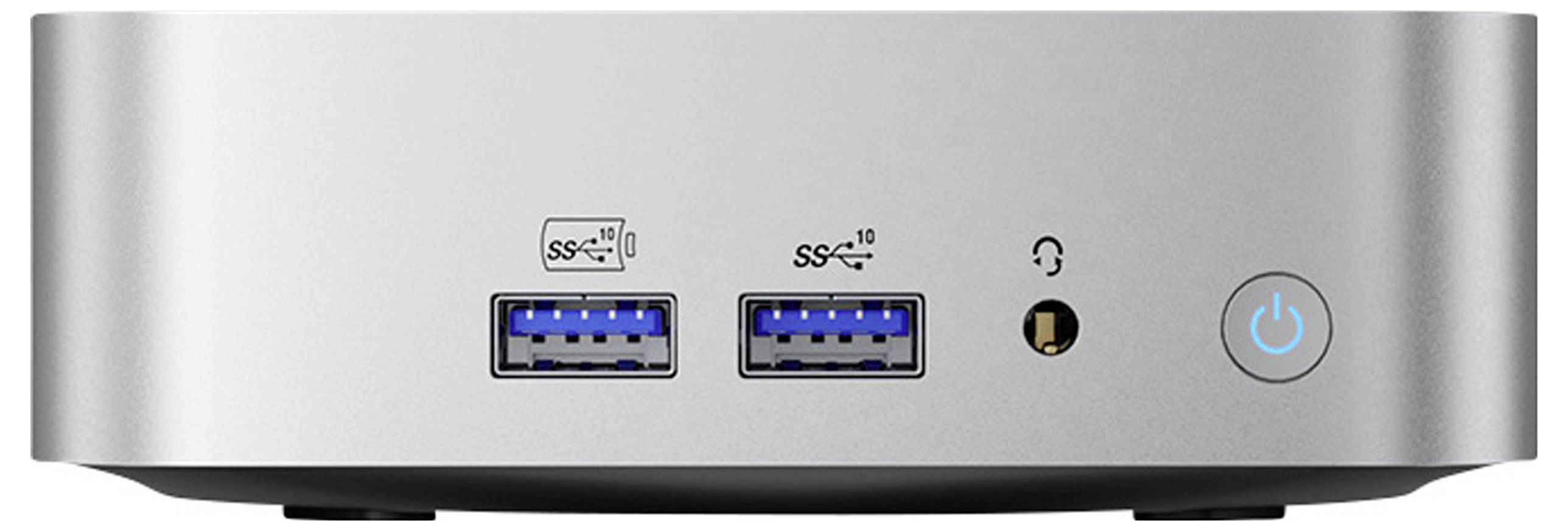 Computer argentato, quadrato, con due porte USB, jack audio e interruttore di accensione sul lato frontale.