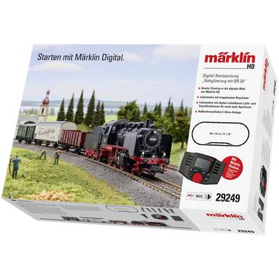 Confezione starter digitale per ferrovia con modello di locomotiva e paesaggio, contrassegnata con 'Iniziare con Märklin Digital'.