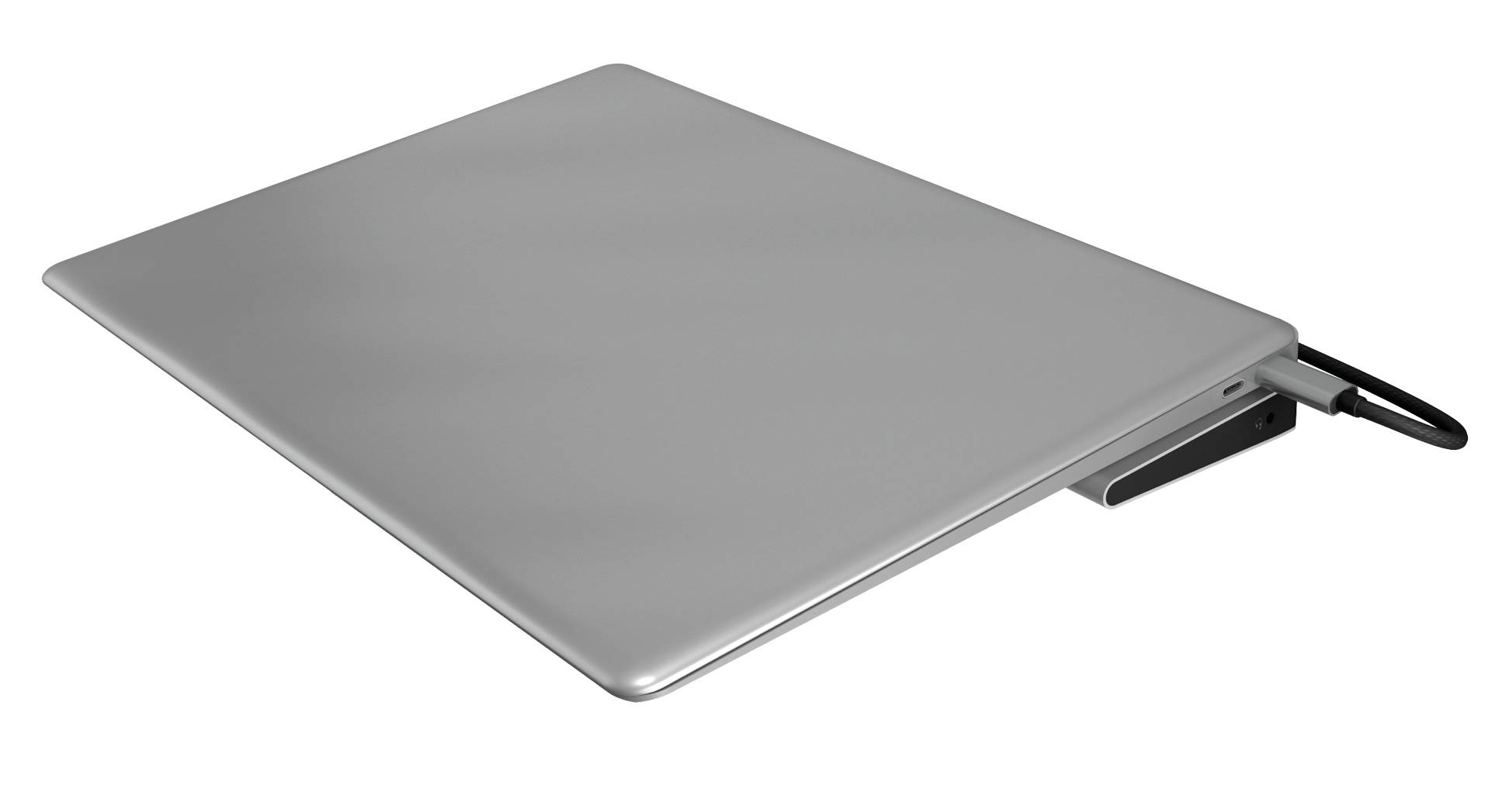Un laptop argentato chiuso, con un dispositivo esterno collegato sul lato.