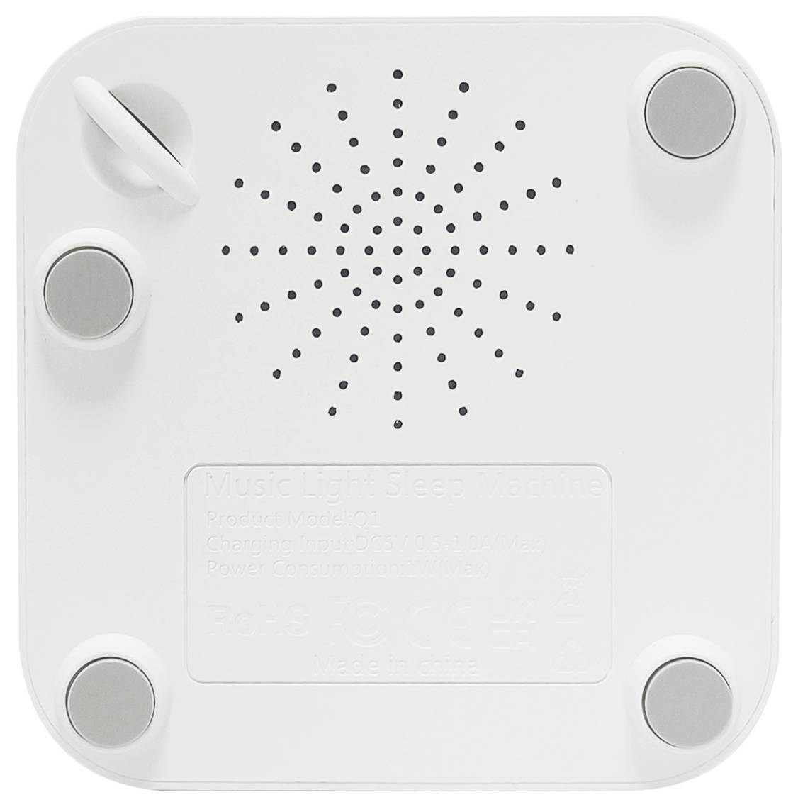 Il lato inferiore di un dispositivo bianco con griglia per altoparlanti, stampe e piedini rotondi in gomma.