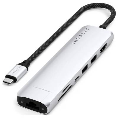 Un hub USB-C color argento con porta Ethernet, porta HDMI, tre porte USB-A e due lettori di schede, collegato con un cavo intrecciato.