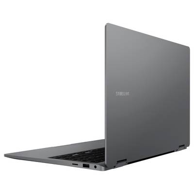 Un laptop d'argento aperto, parzialmente visibile, con la scritta 'Samsung' sul coperchio.