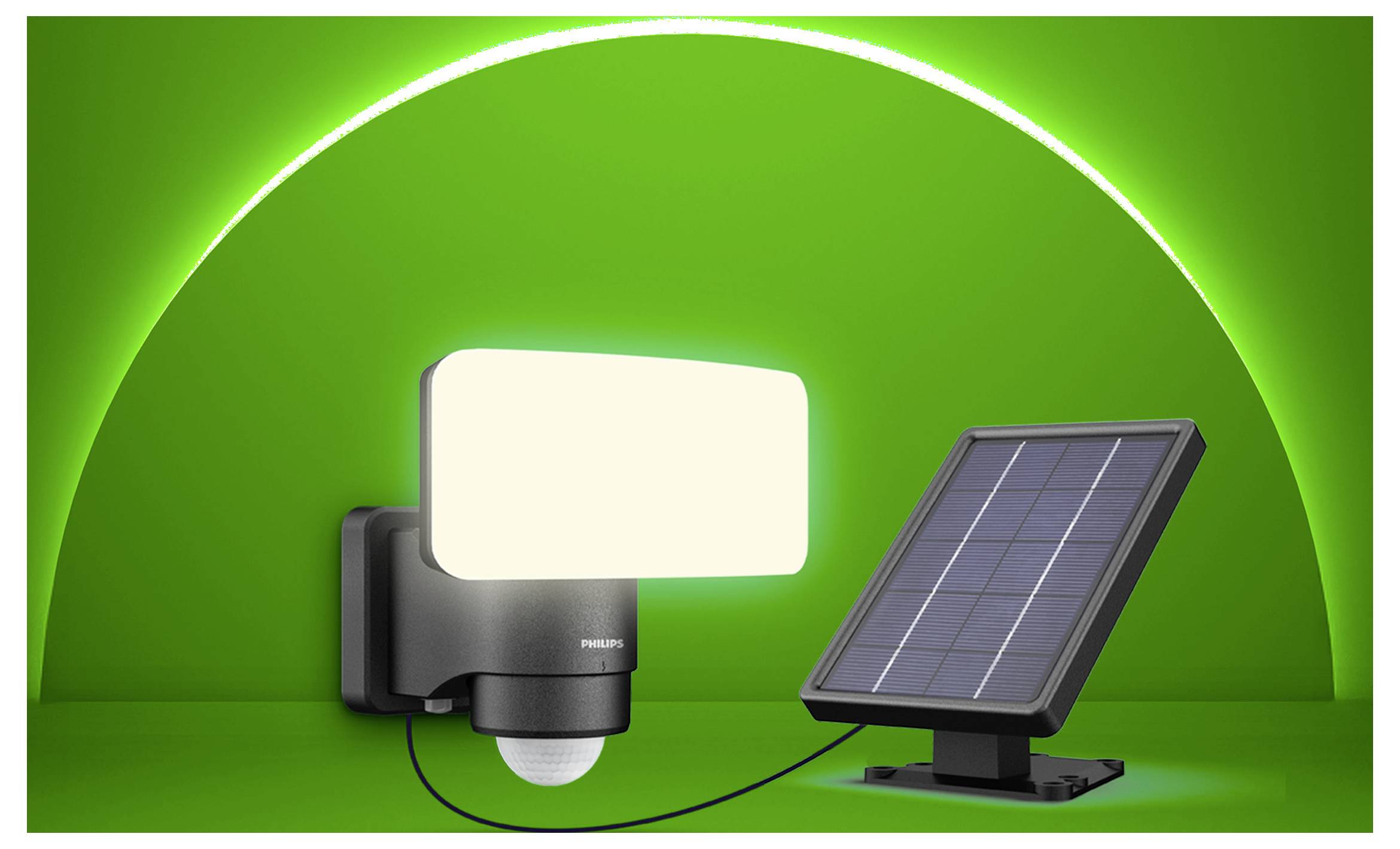 Lampada di sicurezza con sensore di movimento alimentata ad energia solare con pannello collegato su sfondo verde.
